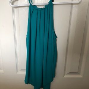 Teal spaghetti strap holster like formal top.